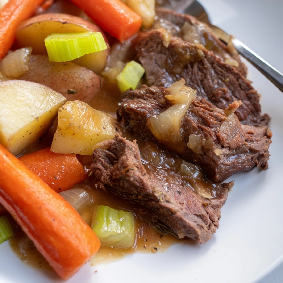 Comforting, slow-cooked Pot Roast with rustic vegetables, perfect for a cozy family dinner.